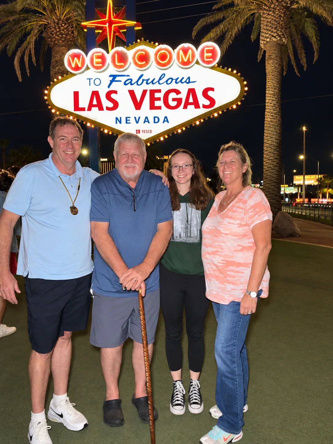 Chris, Wallace, Viona and Staci in front of the Las Vegas sign